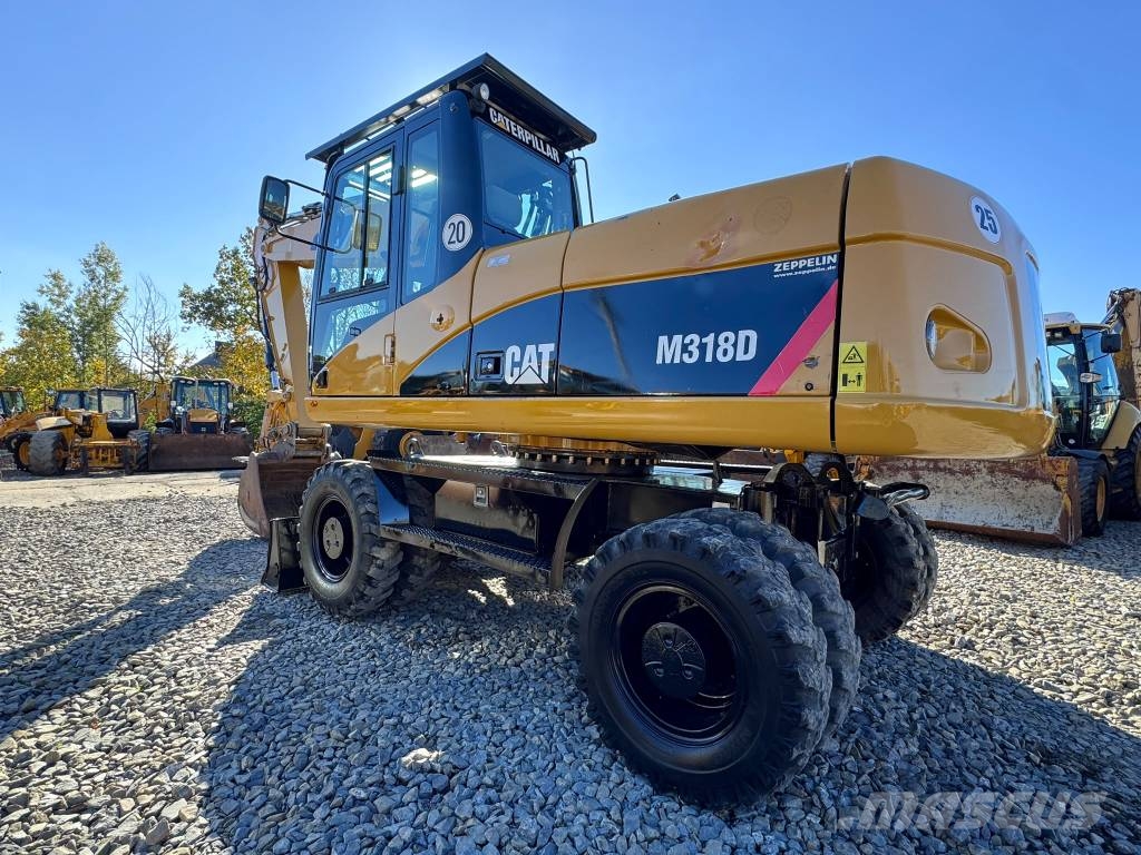 CAT M 318 D Wheeled excavators