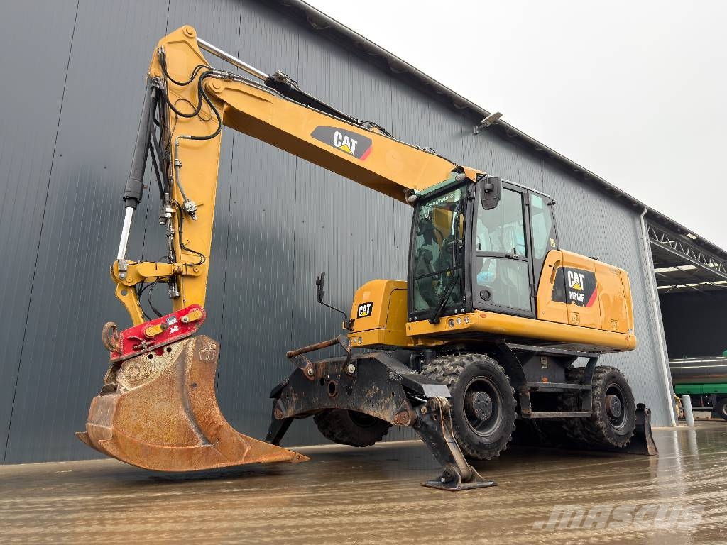 CAT M318F Excavatoare cu roti