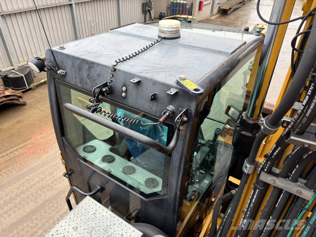 CAT M318F Excavatoare cu roti
