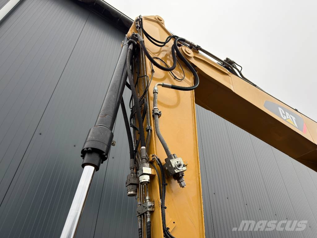 CAT M318F Excavatoare cu roti