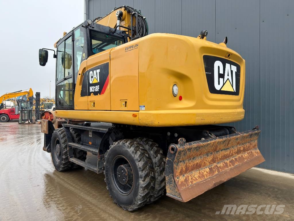 CAT M318F Excavatoare cu roti