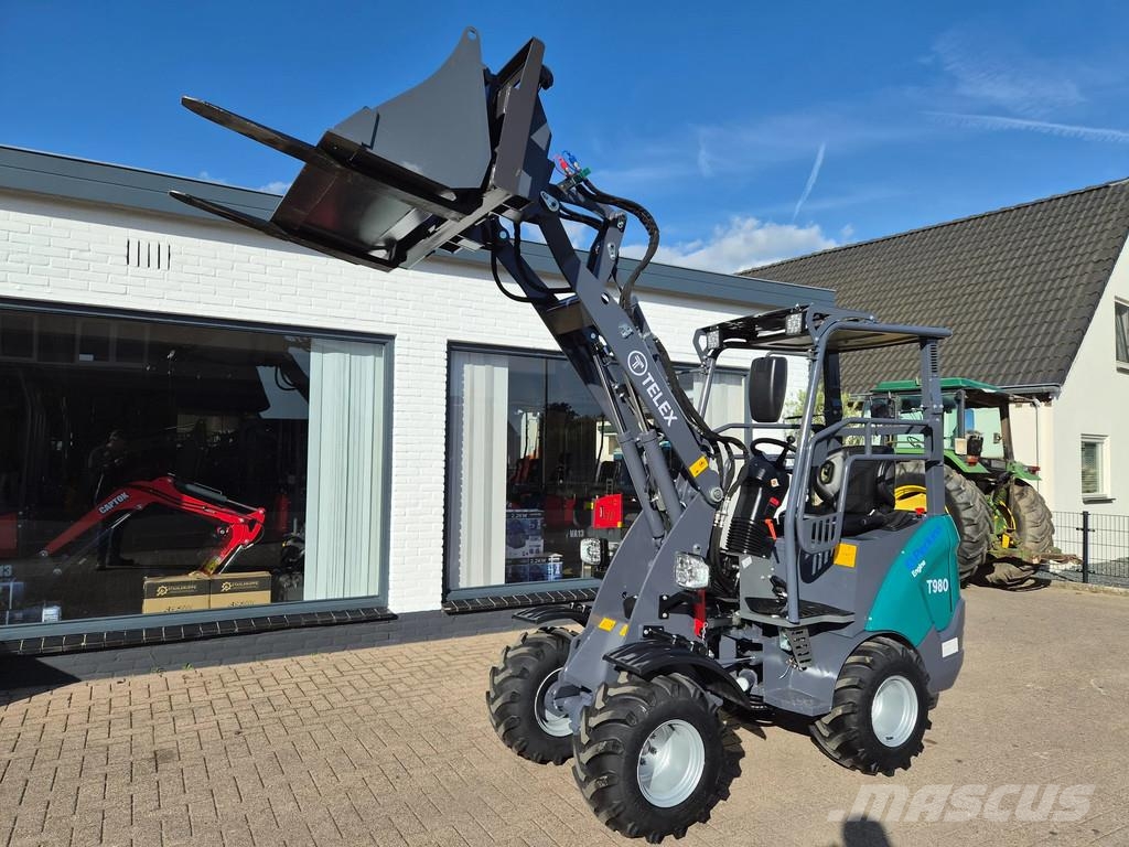 Perkins Telex loader bak en lepels shovel Малі навантажувачі