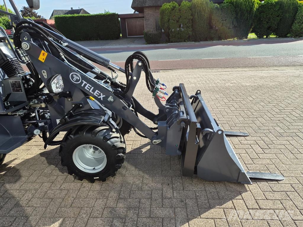Perkins Telex loader bak en lepels shovel Малі навантажувачі