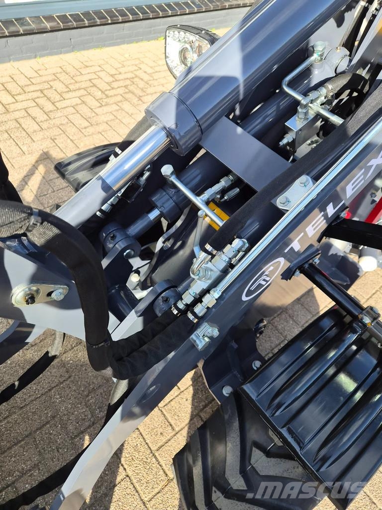 Perkins Telex loader bak en lepels shovel Малі навантажувачі