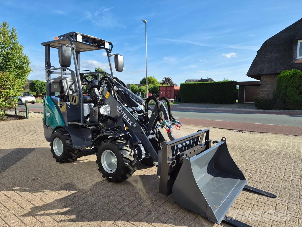 Perkins Telex loader bak en lepels shovel Малі навантажувачі