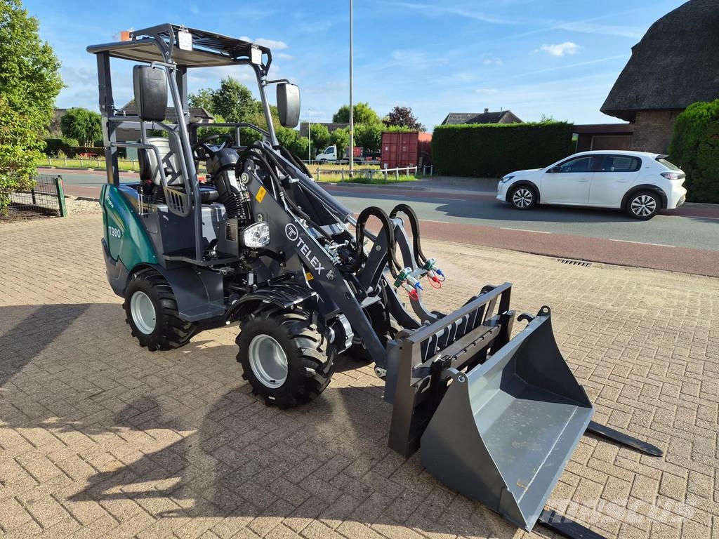 Perkins Telex loader bak en lepels shovel Малі навантажувачі