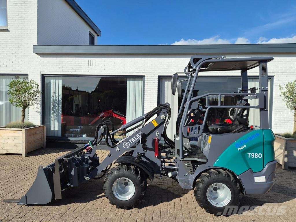 Perkins Telex loader bak en lepels shovel Малі навантажувачі