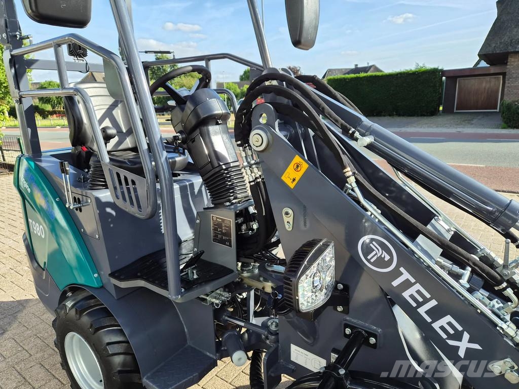 Perkins Telex loader bak en lepels shovel Малі навантажувачі