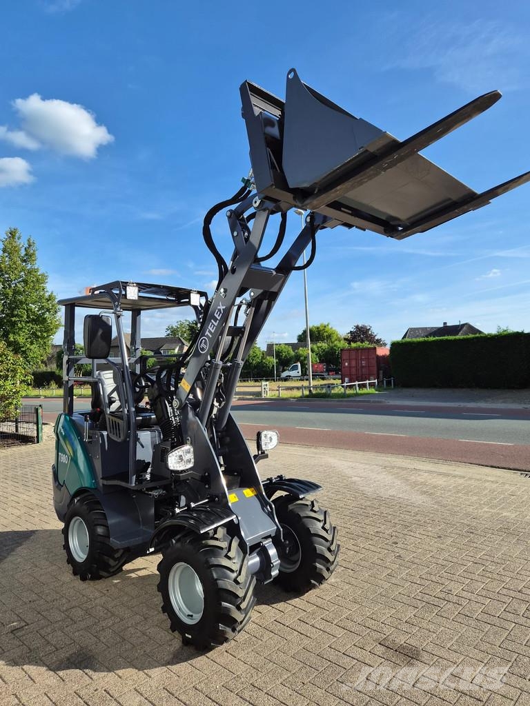 Perkins Telex loader bak en lepels shovel Малі навантажувачі