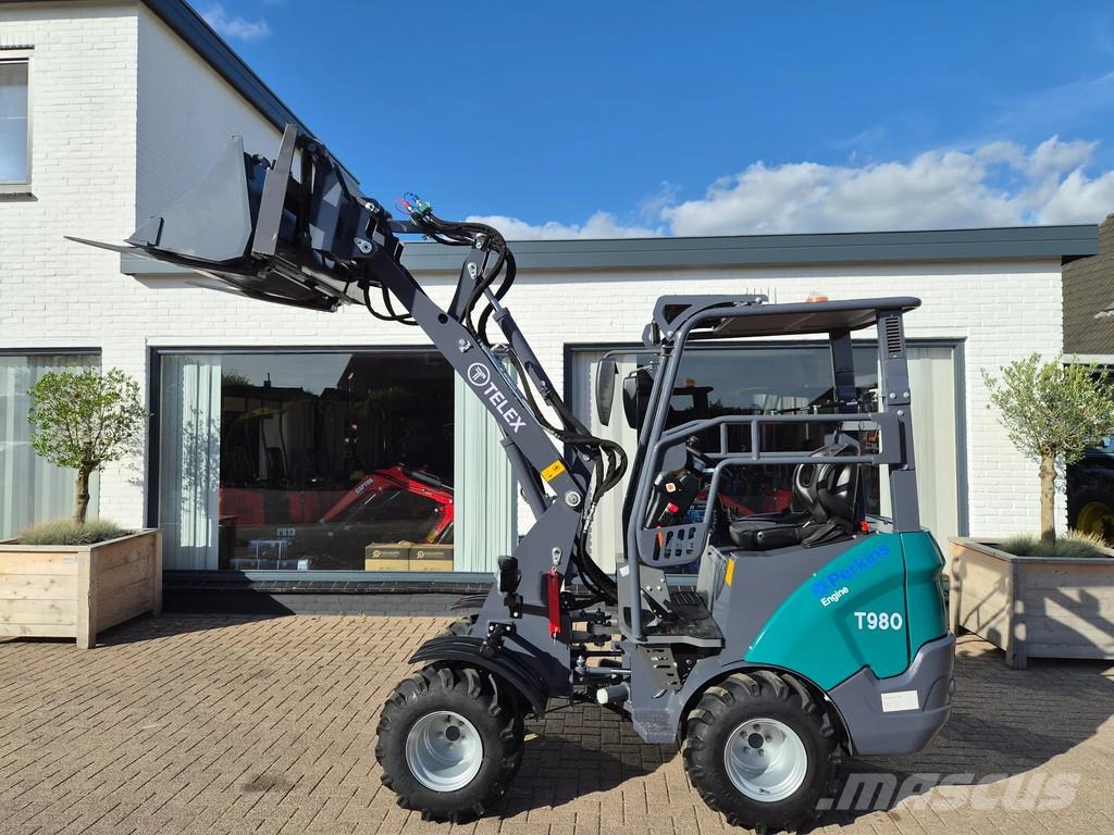 Perkins Telex loader bak en lepels shovel Малі навантажувачі