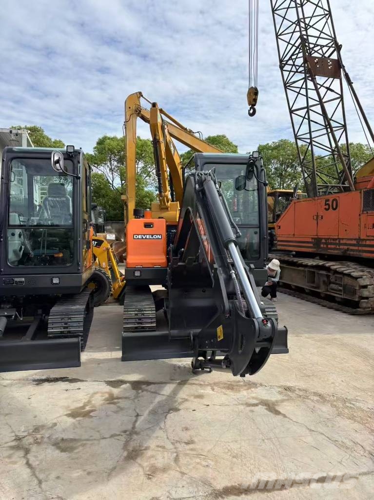 Develon DX 60 D Мини екскаватори < 7 т