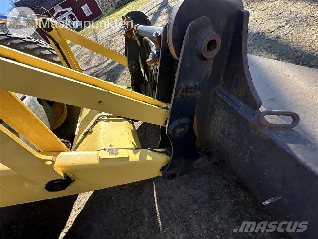 New Holland LB 115 Backhoe