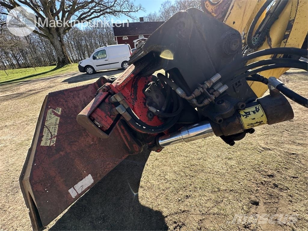 New Holland LB 115 Backhoe