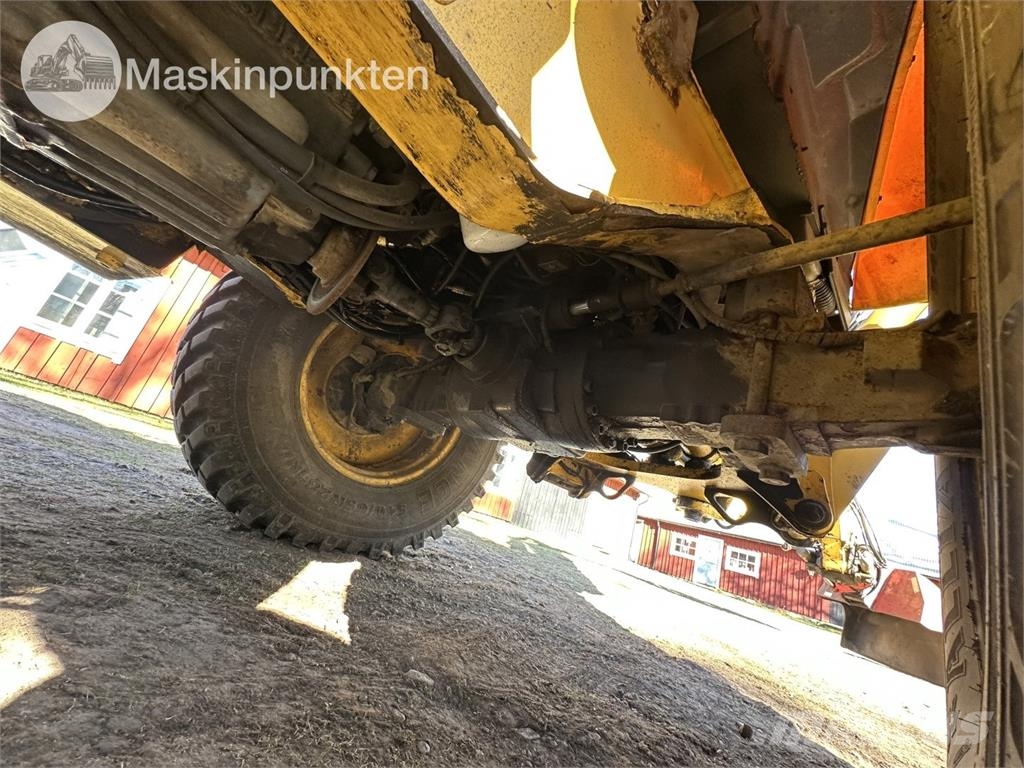 New Holland LB 115 Backhoe