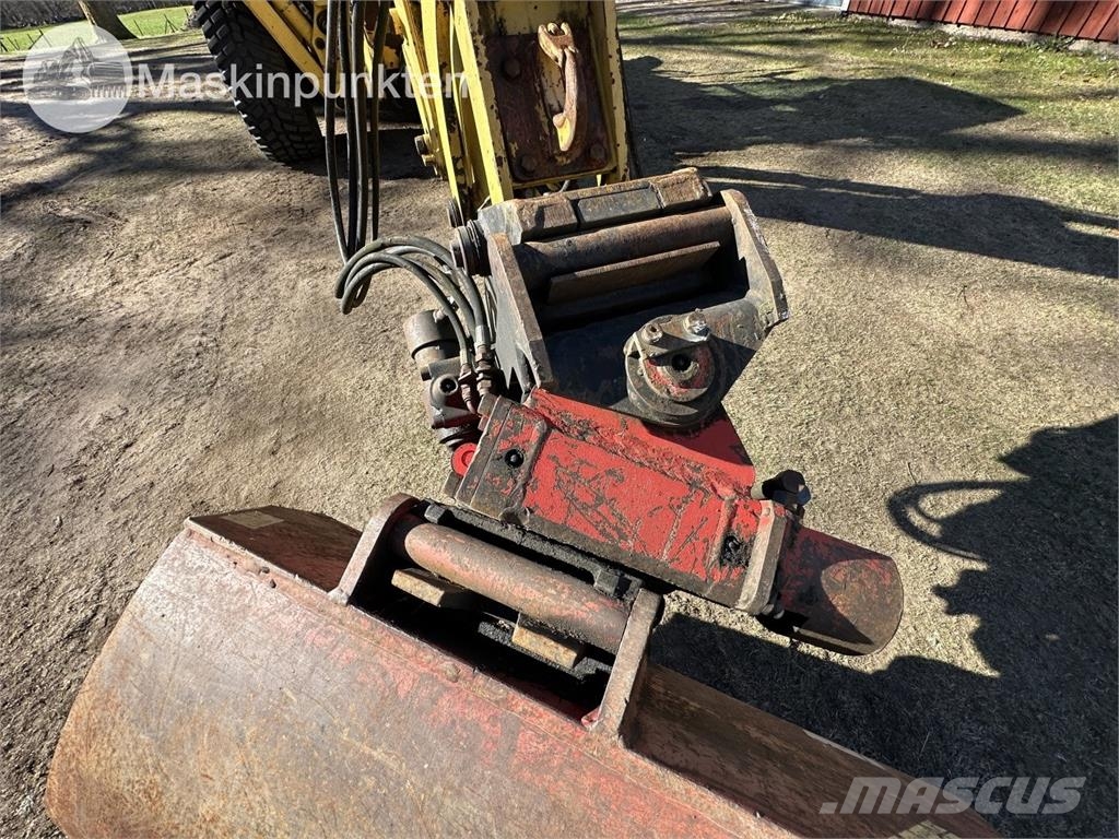 New Holland LB 115 Backhoe