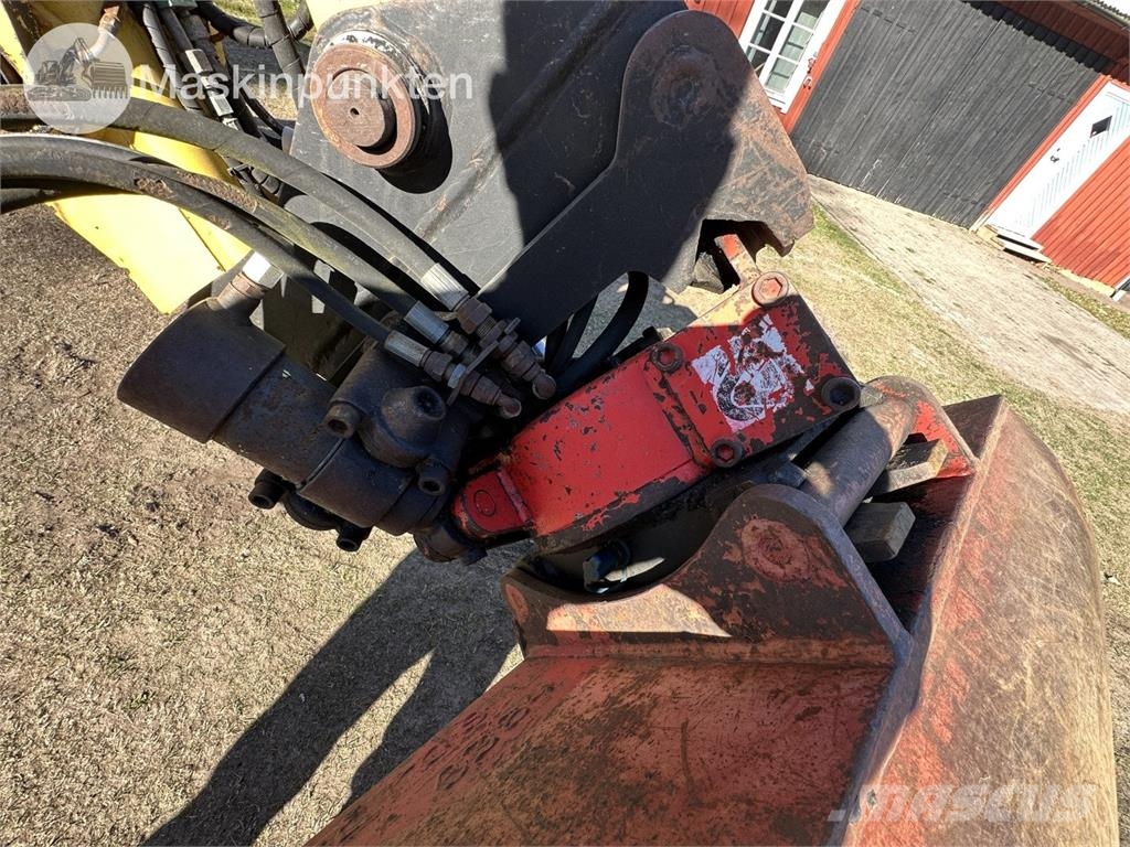 New Holland LB 115 Backhoe
