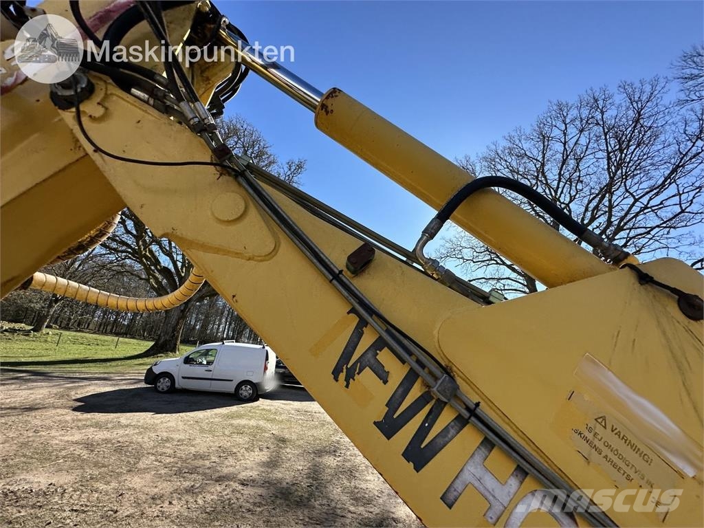 New Holland LB 115 Backhoe