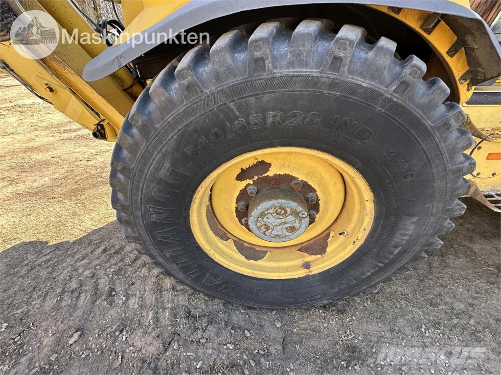 New Holland LB 115 Backhoe