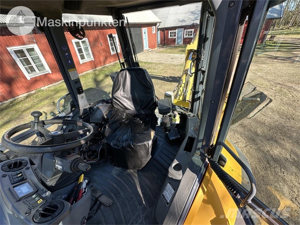 New Holland LB 115 Backhoe