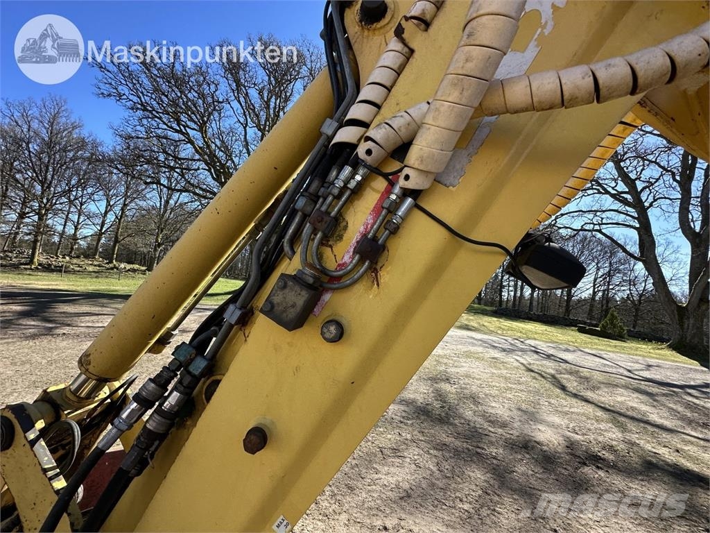 New Holland LB 115 Backhoe