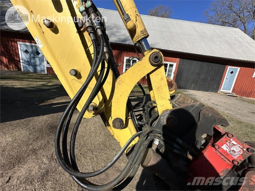 New Holland LB 115 Backhoe