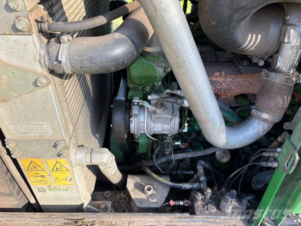 John Deere 1110E Transportadoras