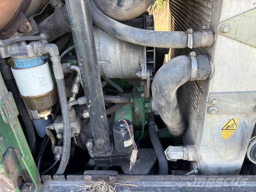 John Deere 1110E Transportadoras
