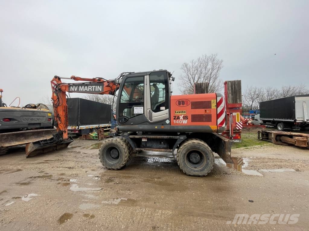 Hitachi ZX 140 W-3 حفارات بعجل