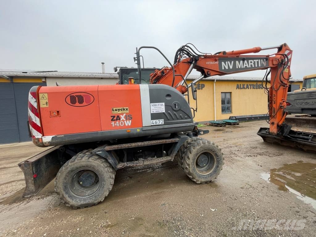 Hitachi ZX 140 W-3 حفارات بعجل