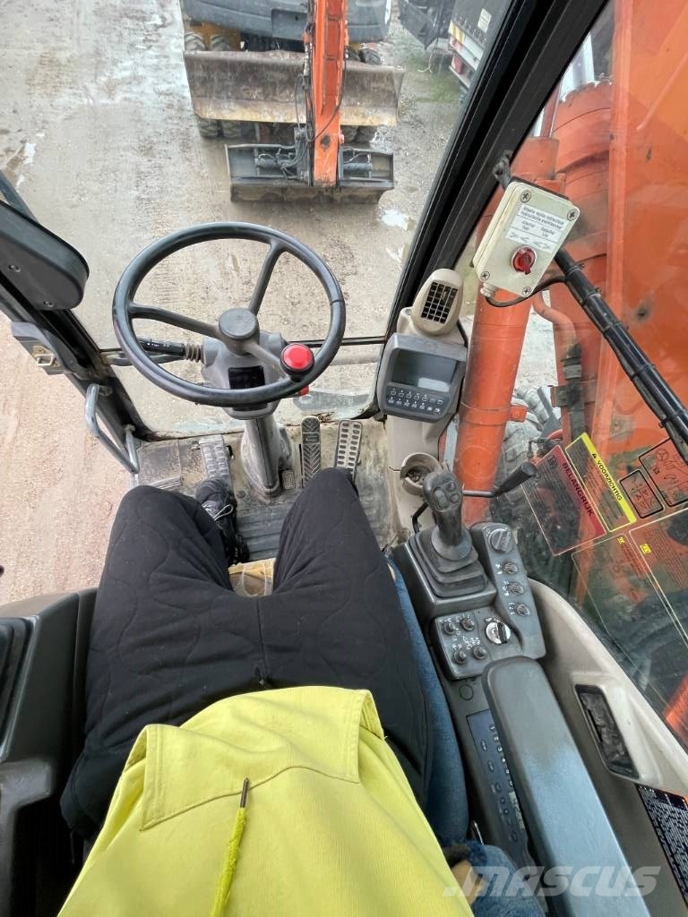 Hitachi ZX 140 W-3 حفارات بعجل