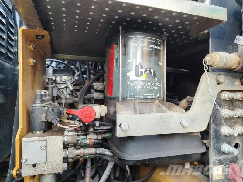 CAT M313D 휠 굴삭기