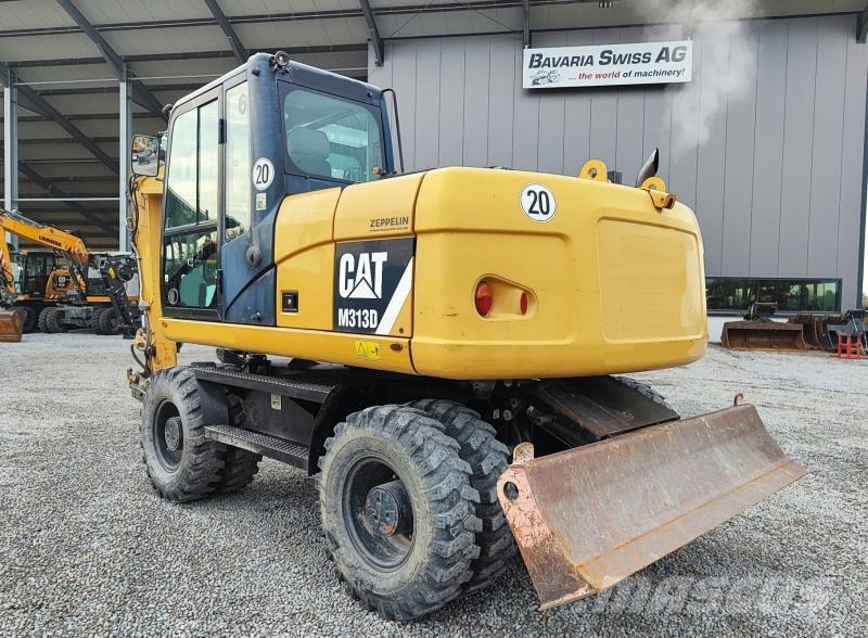 CAT M313D 휠 굴삭기