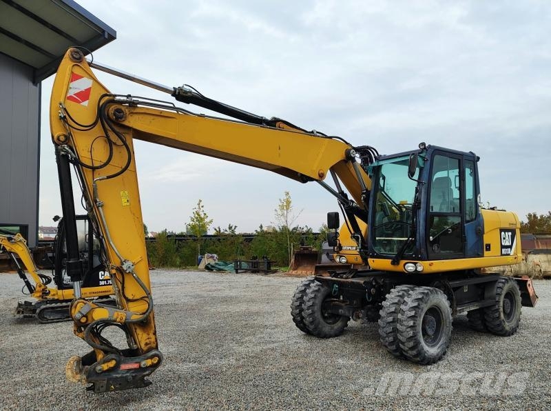CAT M313D Kolesové rýpadlá