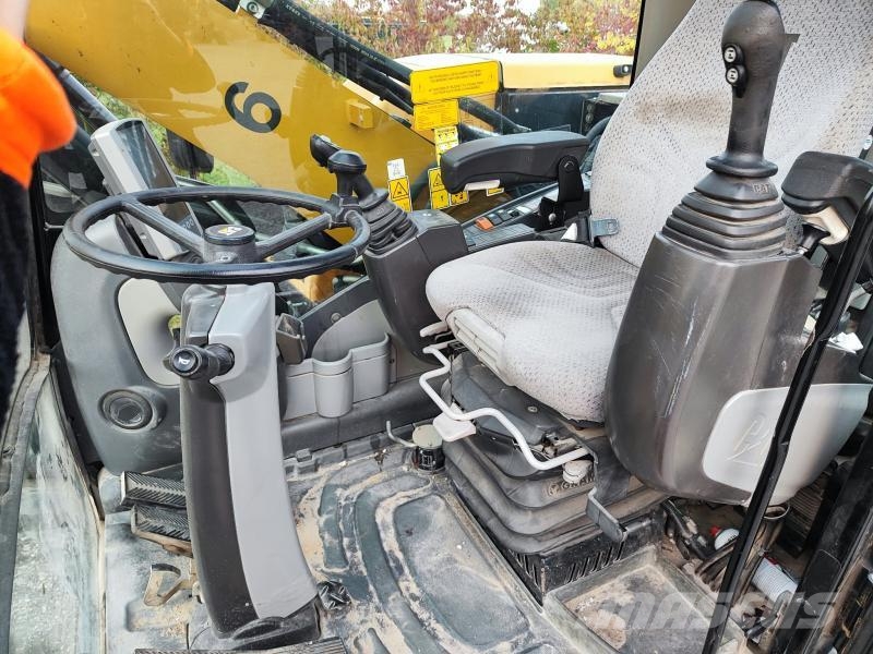 CAT M313D Kolesové rýpadlá