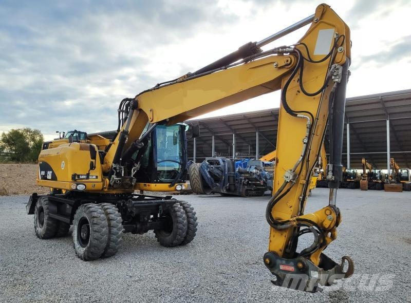 CAT M315D VAH Kolesové rýpadlá