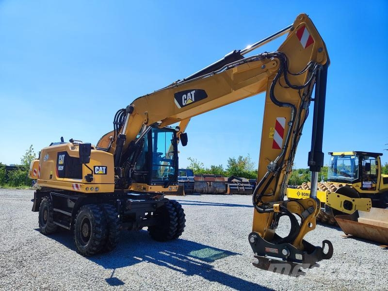 CAT M320F Gumikerekes kotrók