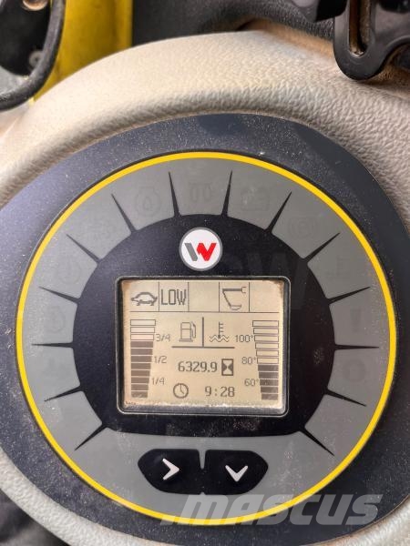 Wacker Neuson EW100 Ratiniai ekskavatoriai