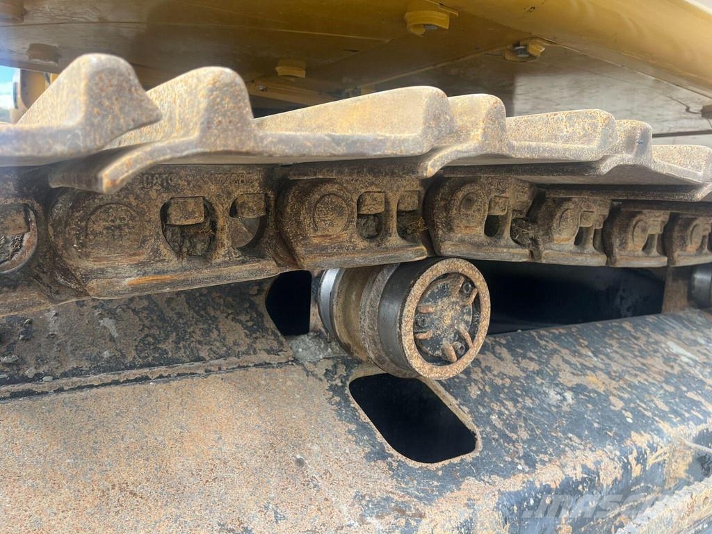 CAT 330 Гусеничні екскаватори
