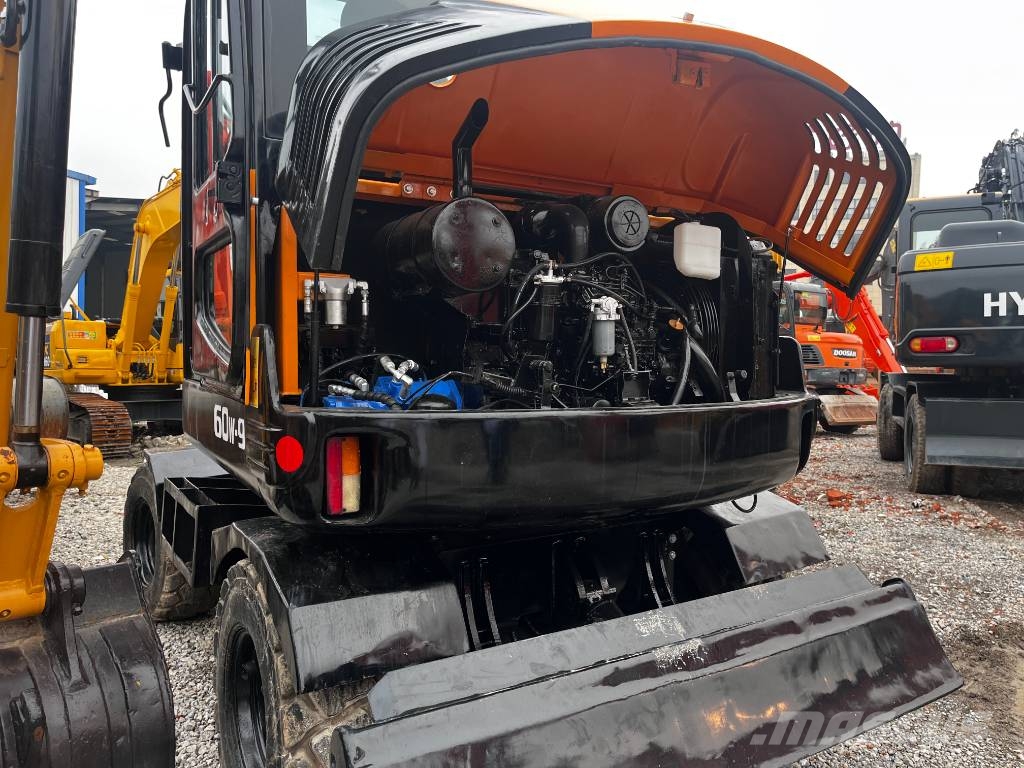 Hyundai 60W-9 Ekskavatori uz riteņiem
