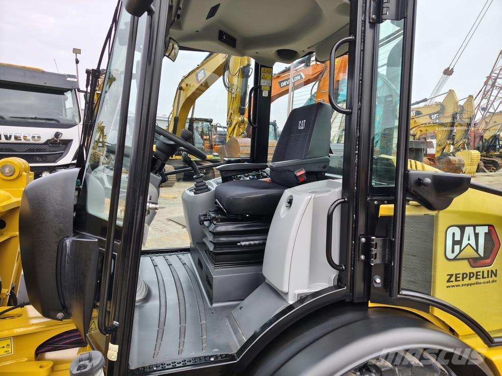 CAT 906M . Utovarivači na kotačima