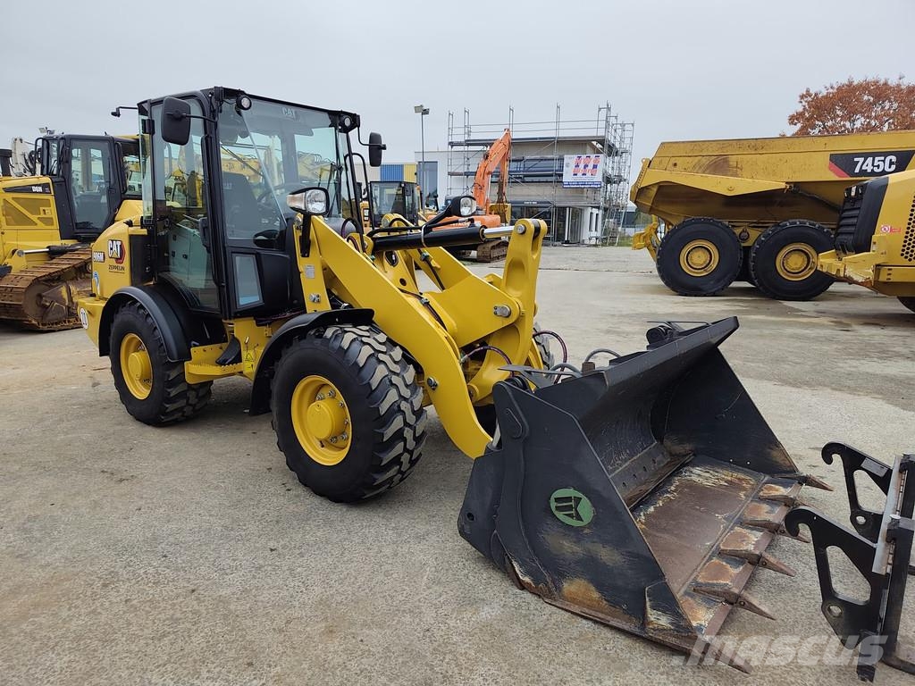 CAT 906M . Utovarivači na kotačima