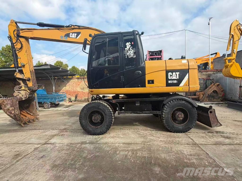 CAT M315D2 Mobilbagger
