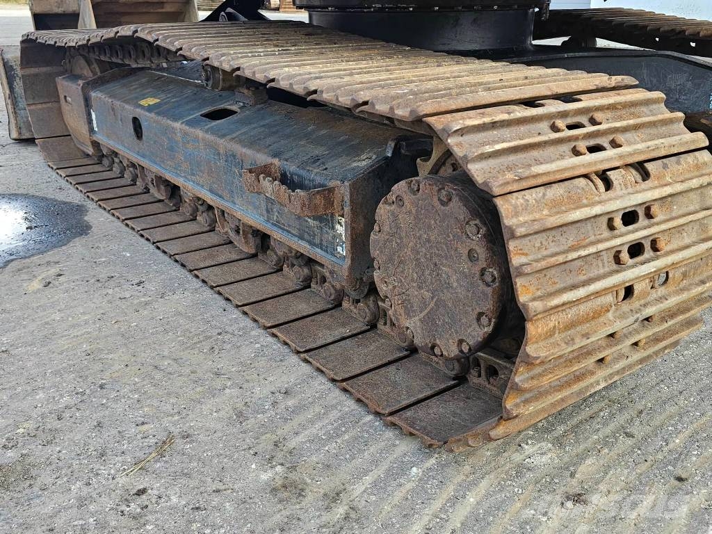 Hitachi ZX 135 US-6 حفارات زحافة