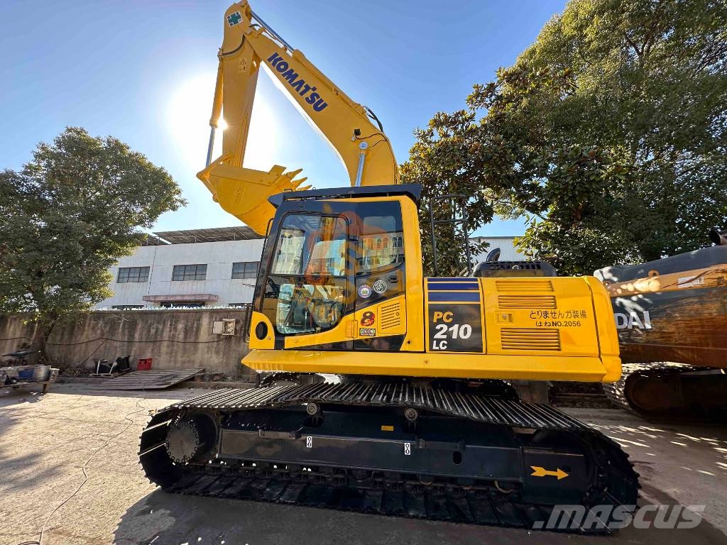 Komatsu PC 210 Bagri goseničarji