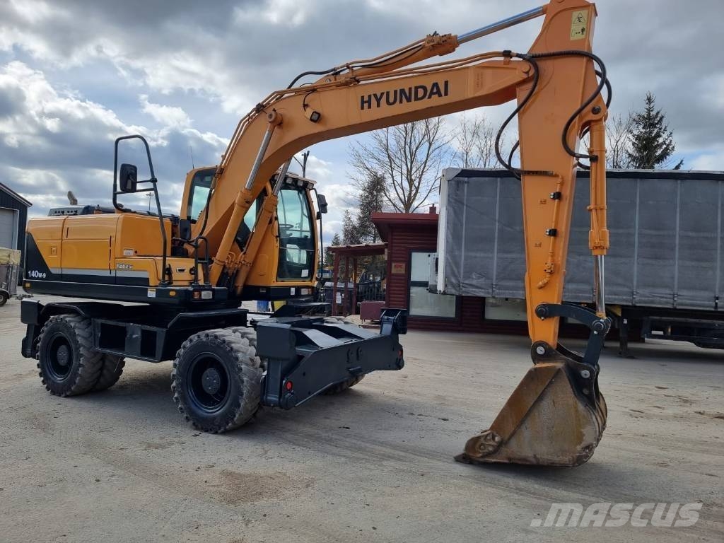 Hyundai Robex 140 W-9 حفارات بعجل
