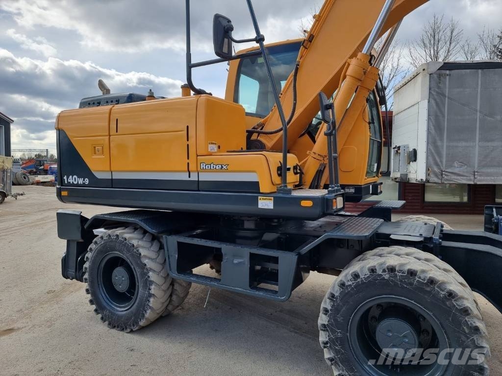 Hyundai Robex 140 W-9 حفارات بعجل