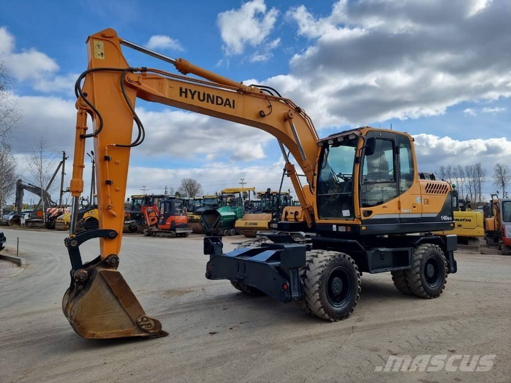 Hyundai Robex 140 W-9 حفارات بعجل