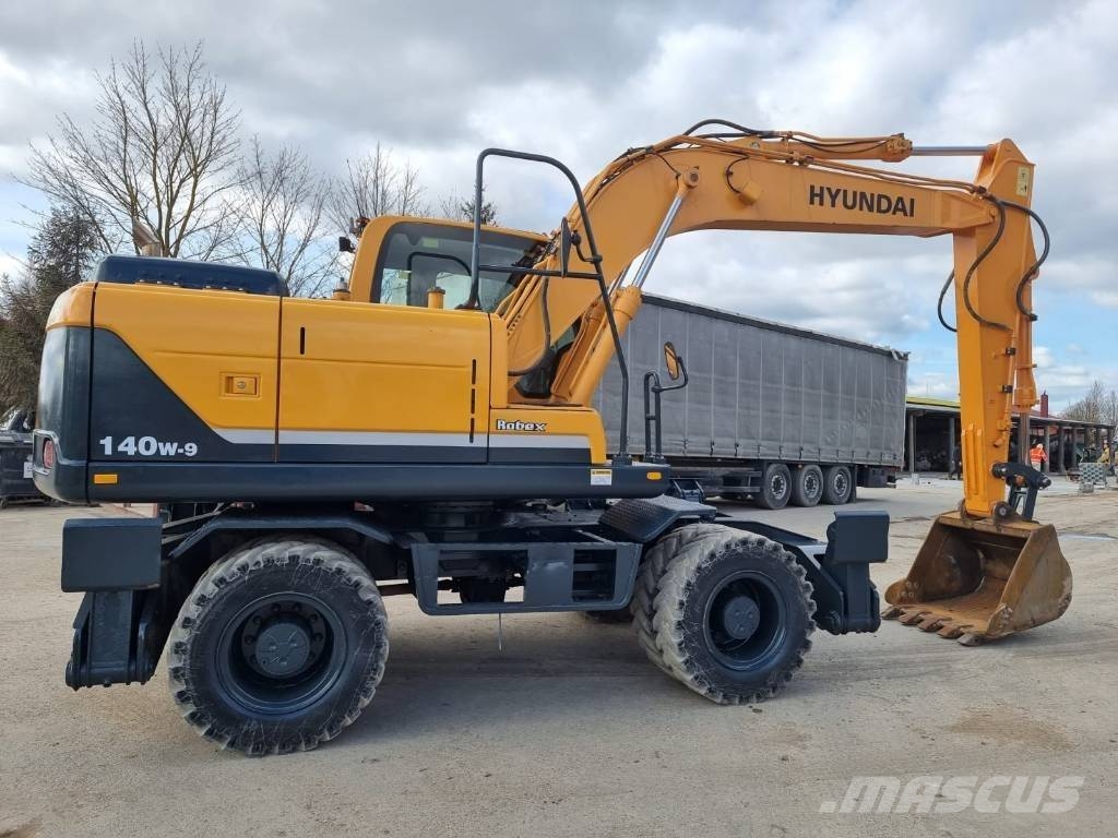 Hyundai Robex 140 W-9 حفارات بعجل