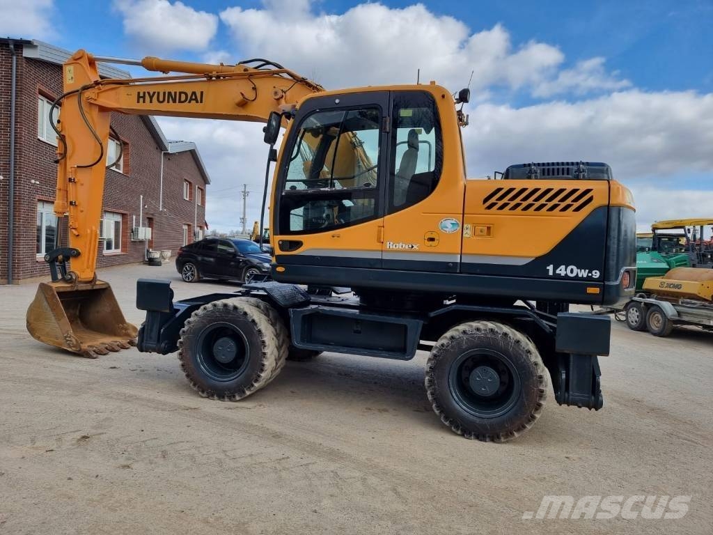 Hyundai Robex 140 W-9 حفارات بعجل