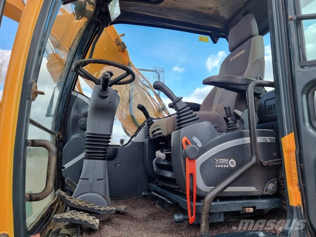 Hyundai Robex 140 W-9 حفارات بعجل